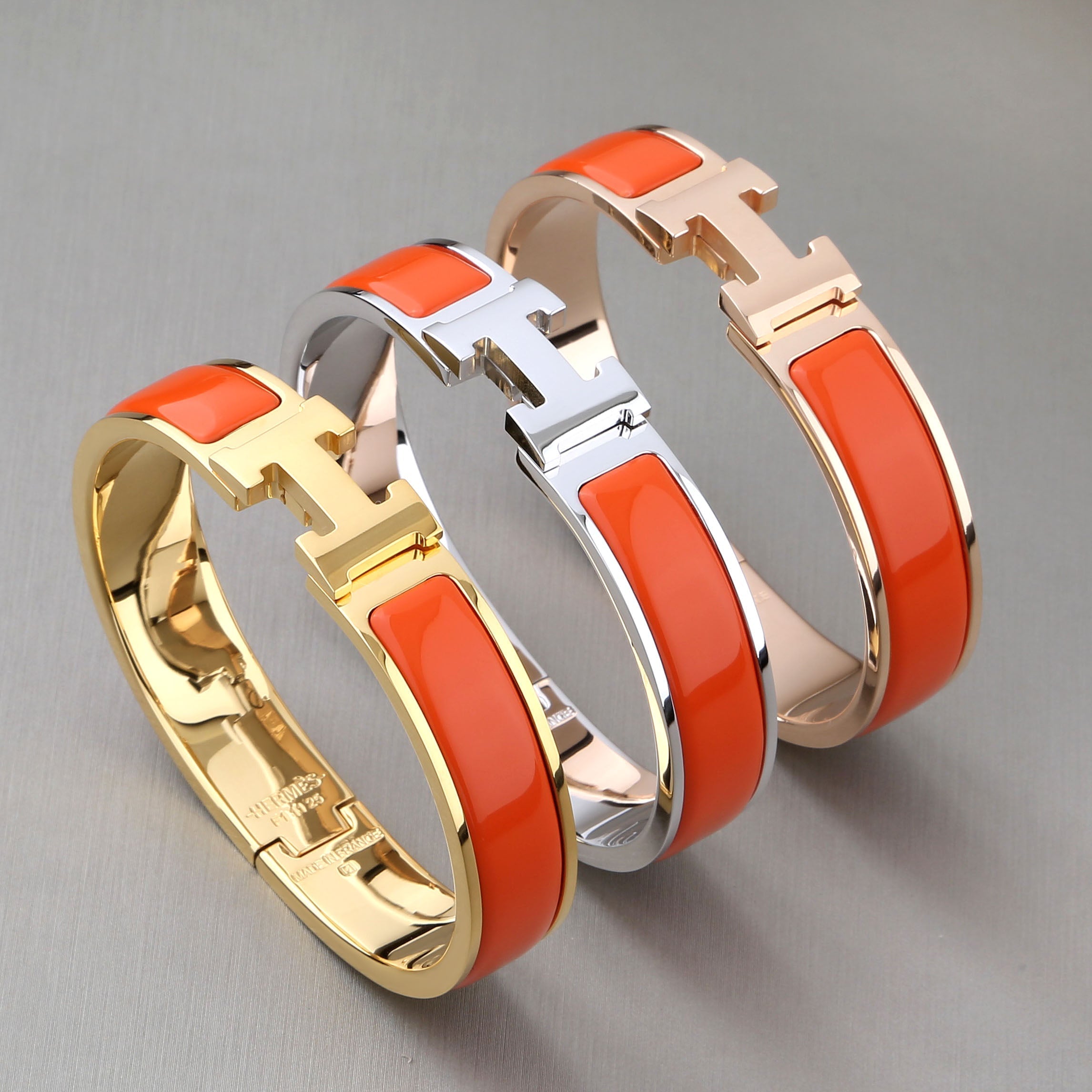 HERMES H ORANGE BRACELET