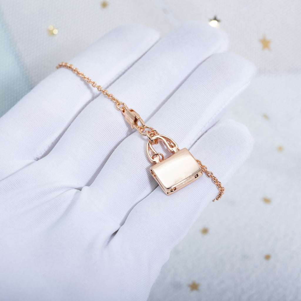 HERMES AMULETTE CONSTANCE PEDANT PINK GOLD NECKLACE