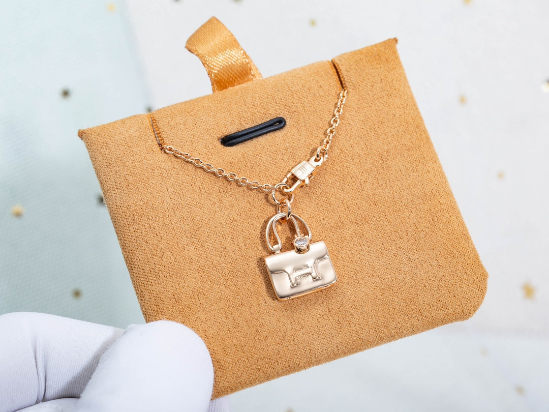HERMES AMULETTE CONSTANCE PEDANT PINK GOLD NECKLACE