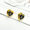 Chanel Black Enamel Gold Double C Heart Earrings