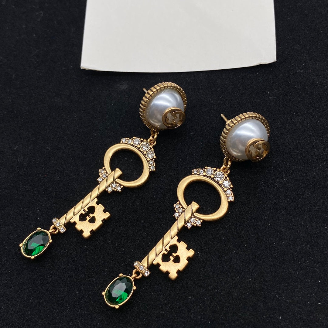 GUCCI KEY SHAPED DANGLE GG EARRING