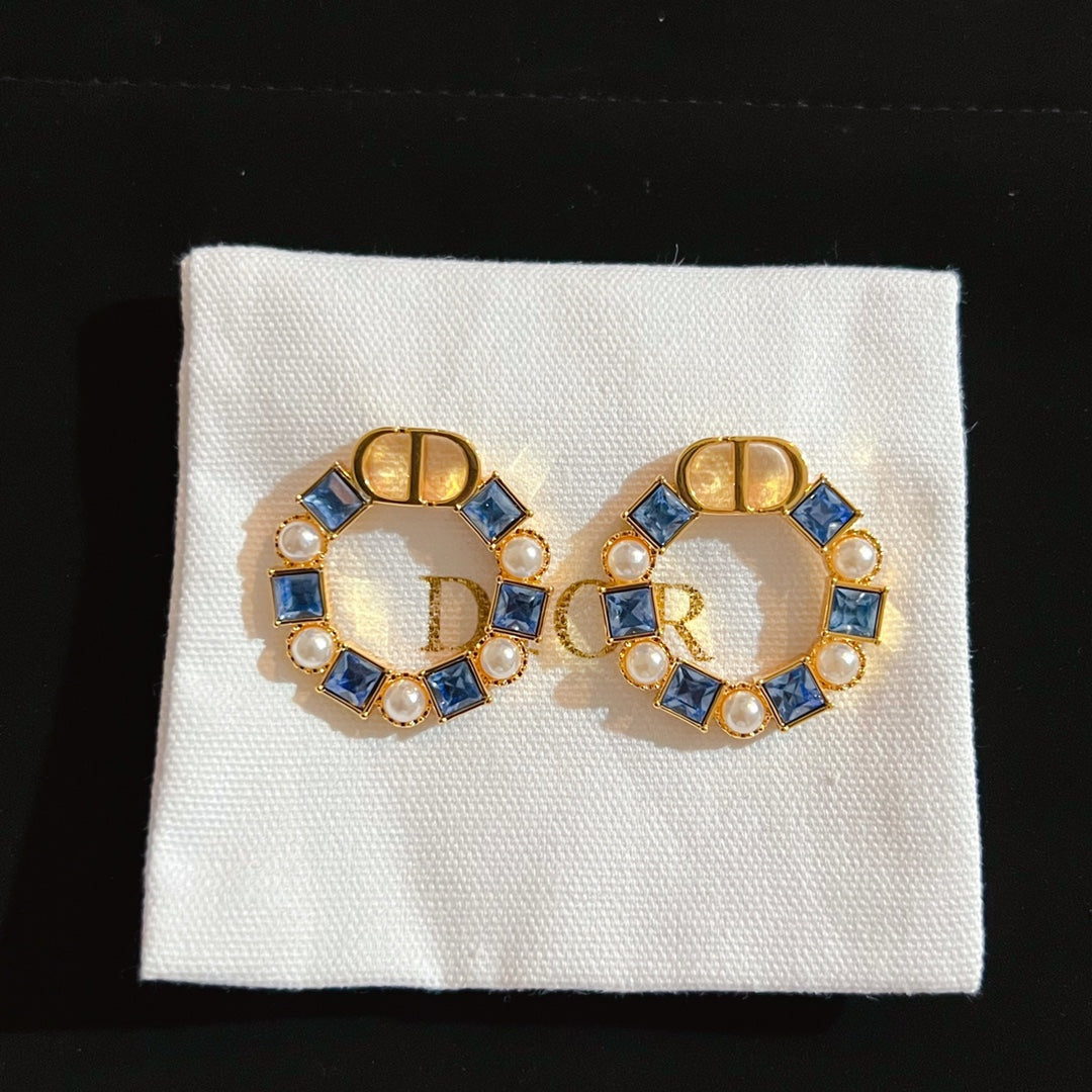 DIOR CD EARRINGS GOLD-FINISH METAL WITH RESIN PEARLS AND AMBER-COLORED CRYSTALS