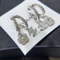 Chanel Silver Asymmetrical Earrings