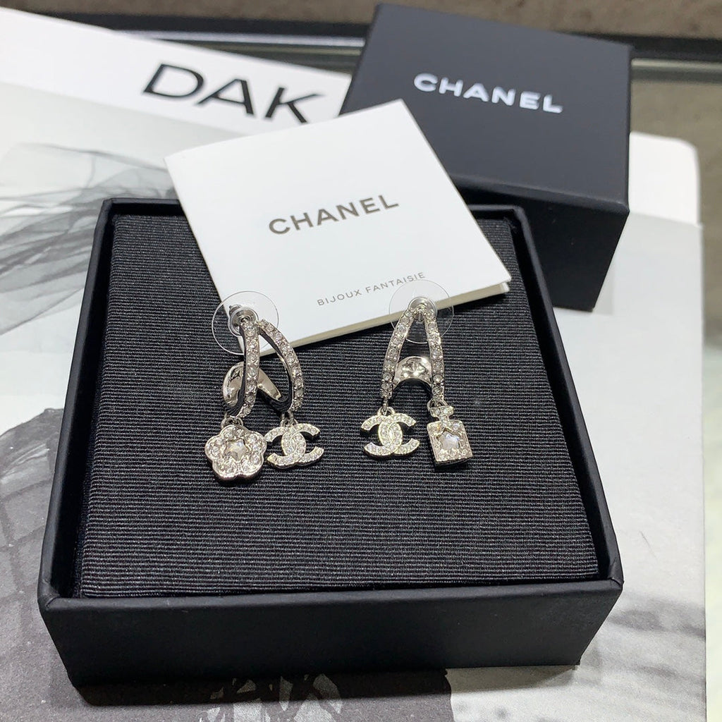 Chanel Silver Asymmetrical Earrings