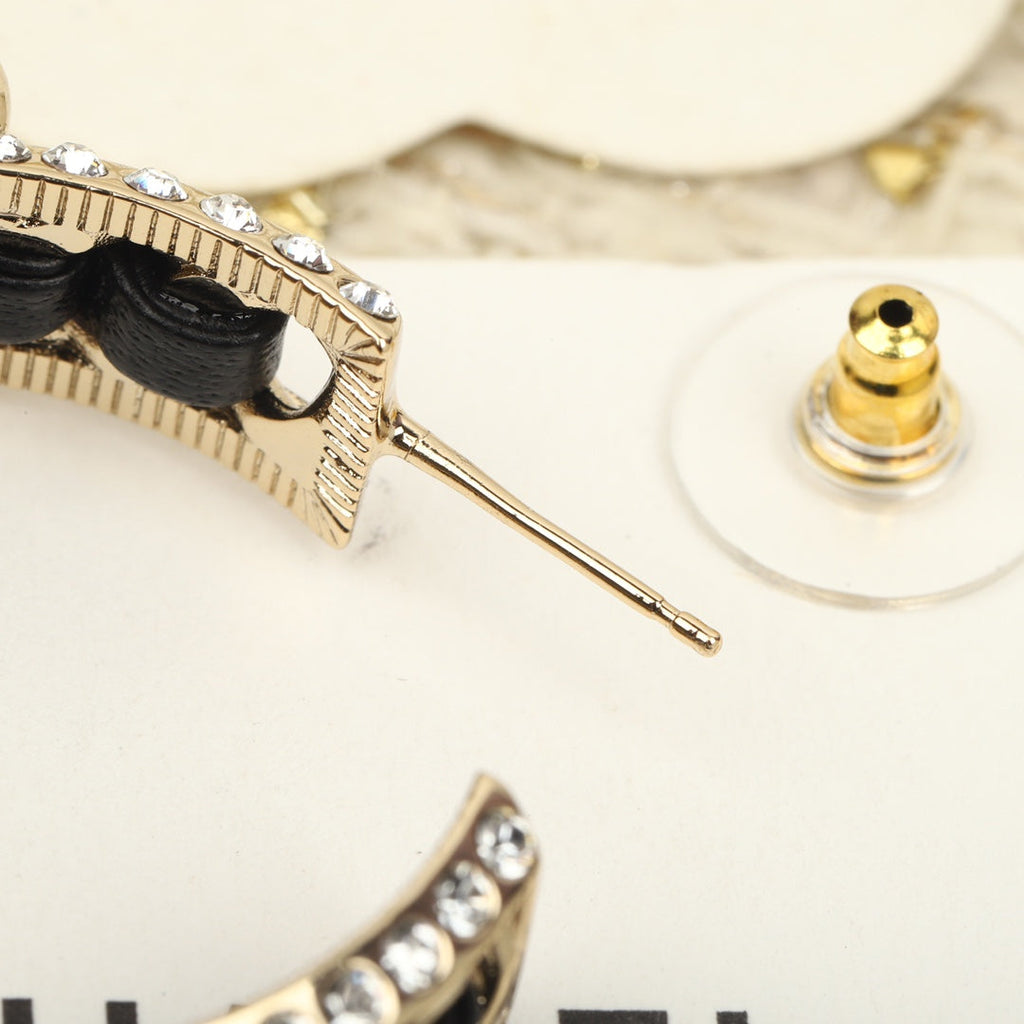 Chanel Double C Gold Leather Curved Hook Stud Earrings